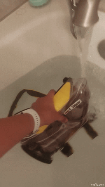 Testing the underwater housing in a bathtub with a shirt inside